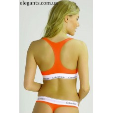 Женский набор нижнего белья : трусики стринги + майка оранжевого цвета «Calvin Klein» (USA) купить на сайте супермаркета - интернет магазина одежды «Элегант» Сумы (Украина) - смотреть видео девушки топ модели фото каталог Кальвин Клейн (США)